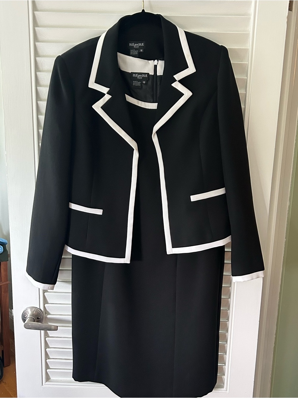 Black Dress and Jacket with White Trim